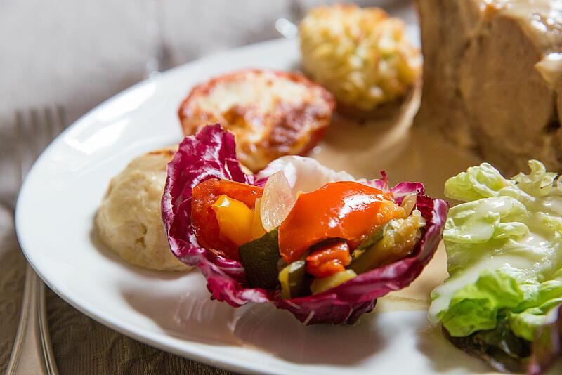 [Translate to Allemand:] Plat gastronomique dans un restaurant de camping luxe en France